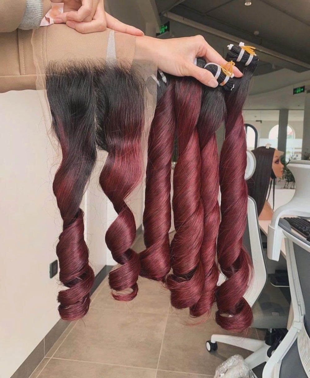Bouncy curly hair bundles made from 100% raw Vietnamese human hair.