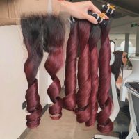 Bouncy curly hair bundles made from 100% raw Vietnamese human hair.
