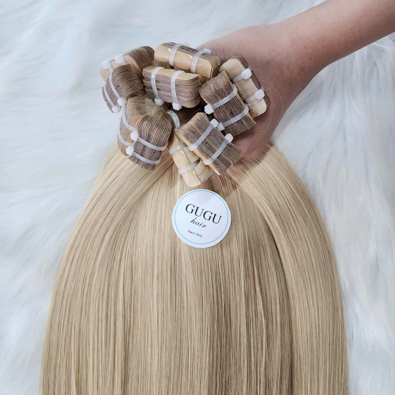 26 Inch Blonde Best Tape In Hair Extensions Vietnamese Human Hair 7 26-inch-blonde-best-tape-in-hair-extensions-vietnamese-human-hair-guguhair.