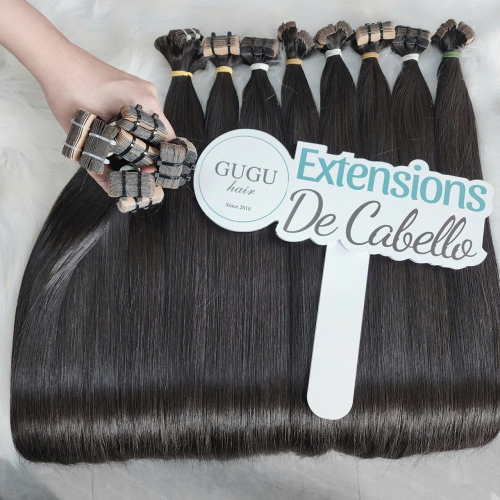 24 inch Vietnamese tape-in hair extensions in natural black color by GUGUHAIR