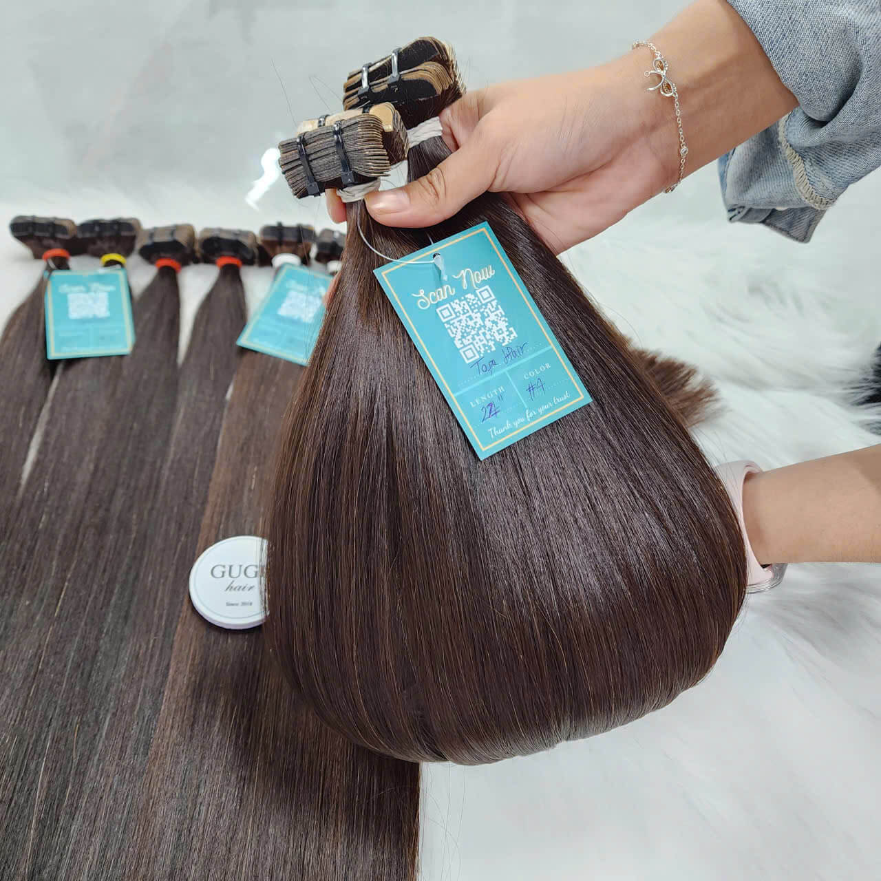 Seamless Tape In Hair Extensions – 22 Inch Brown Vietnamese Human Hair 7 bone straight tape in hair extensions raw human hair highlights